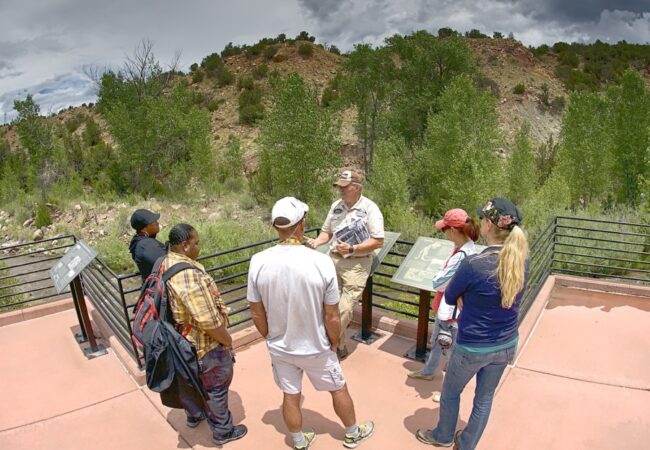 Tour guide explaining to 5 people about the Red Canyon Colorado Jeep Tours