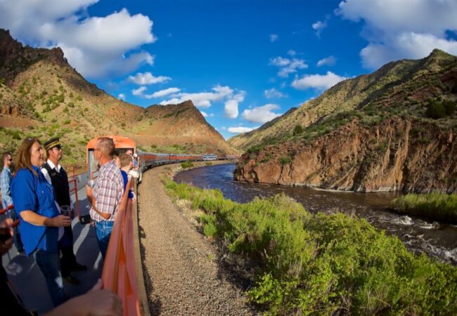 guests enjoying the outdoor view on Royal Gorge train