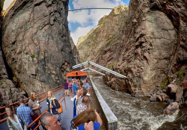 guests enjoying the Royal Gorge from outside the train