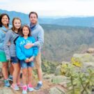 family posing for photo above Royal Gorge Colorado Jeep Tours