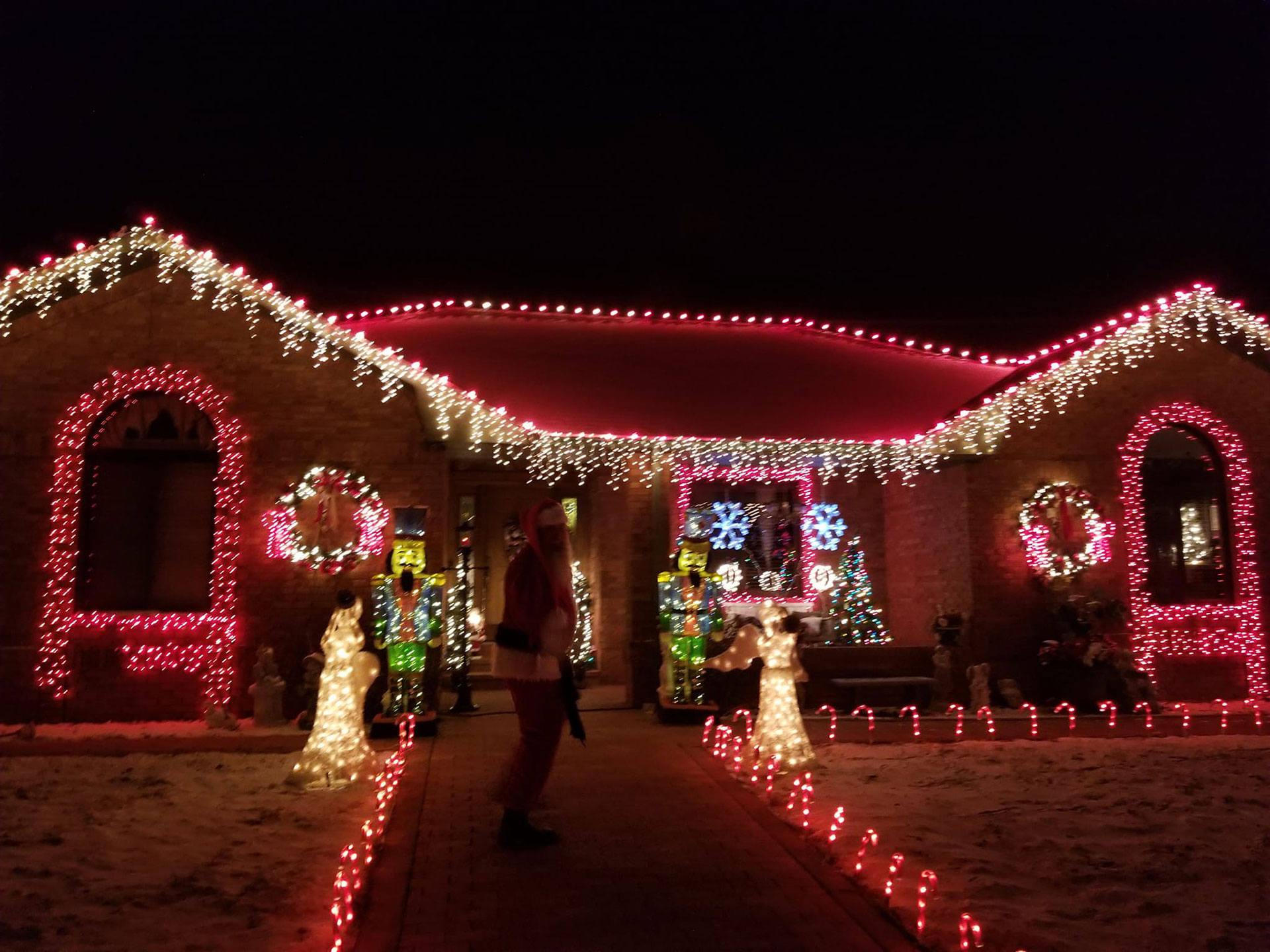 Santa walking into his House